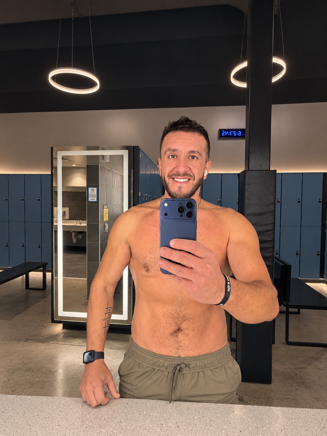 G sharing a gym mirror portrait from his personal transformation journey